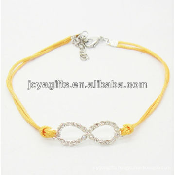 Yellow wire diamante number eight alloy woven bracelet